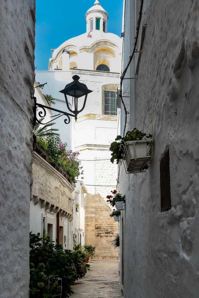 A detailed guide to Locorotondo, Puglia Italy | Top 10 things to do in Locorotondo 8 The view from the narrow streets of Locorotondo - a glimpse of the narrow streets of the Italy fairytales town