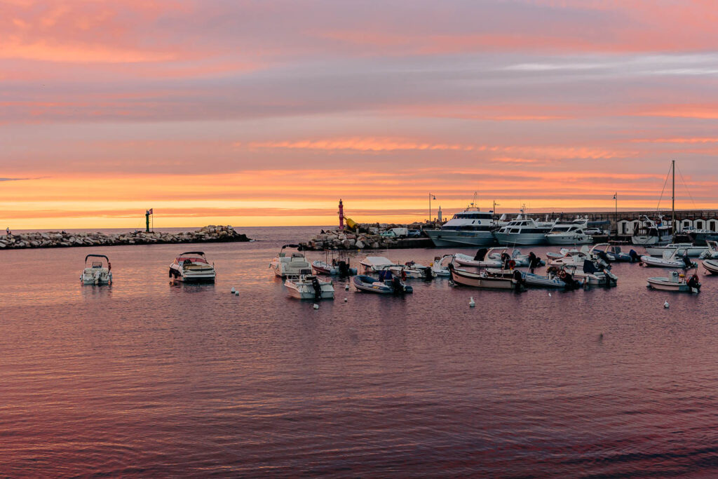 25 Best beaches in Puglia + hidden spots ideal for summer 3 A beautiful view of Peschici at sunset - Puglia, Italy