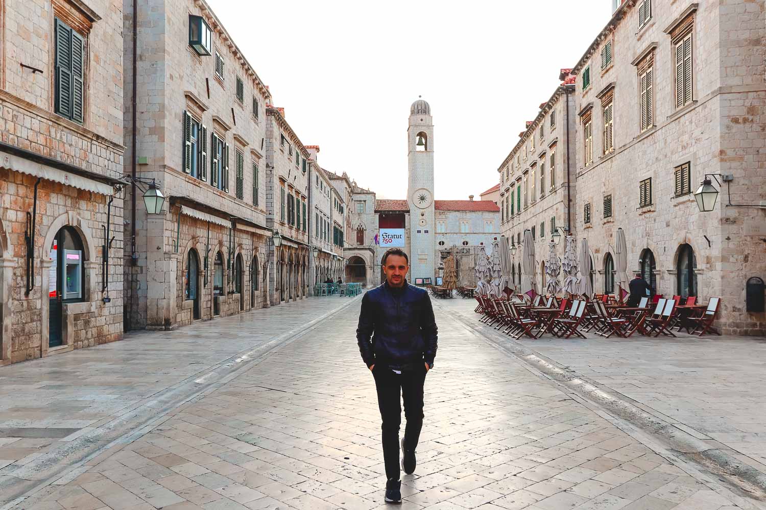 Clock tower in the back ground and a little walk from Luza Square to Pile Gate in Dubrovnik, early morning start for Italian Trip Abroad Team to get the most instagrammable spots in Dubrovnik