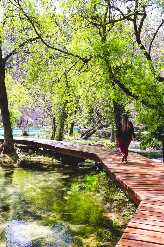 Bimba walking along Krka national park - Things to do in Croatia - Krka National park day trip from Split 