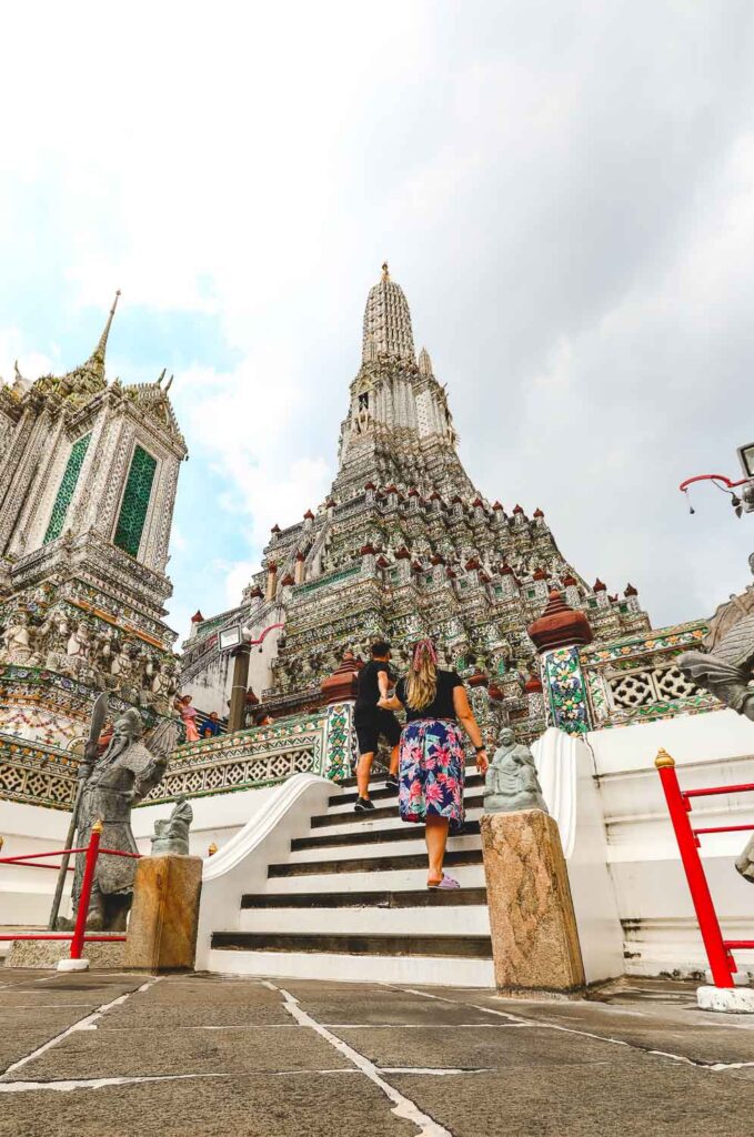 Bimba and Toti walking up the stiars of Wat Arun - Best photo spots in Bangkok Thailand