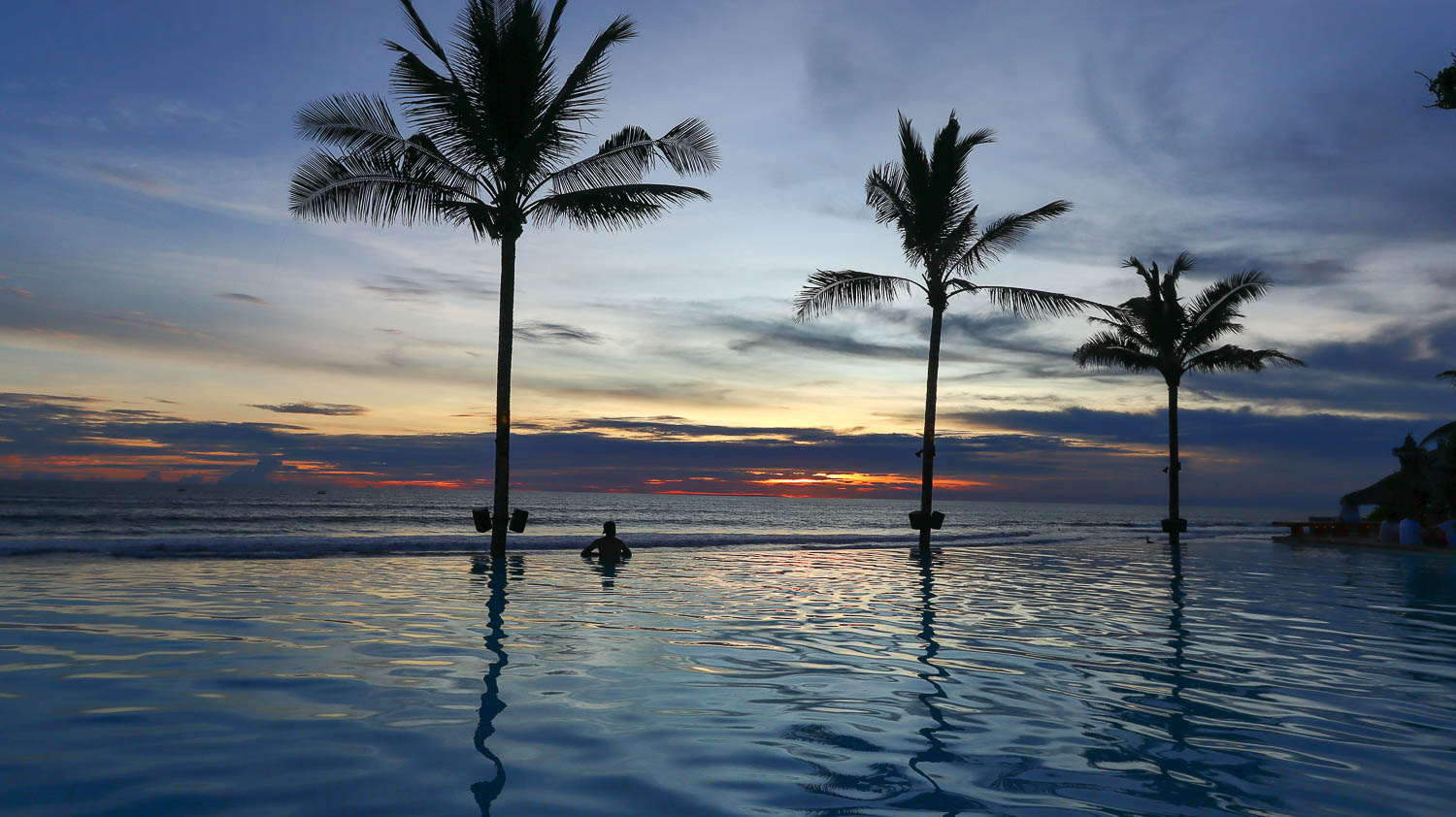 Sunset in Bali - Potato Head Beach Club - Toti enjoying the pool for sunset