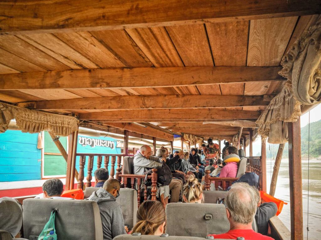 Unveiling the hidden gems: An unforgettable Laos itinerary 2 weeks 6 The boat that goes on the Mekong River is the only way for the villages to connect with the main cities in Laos
