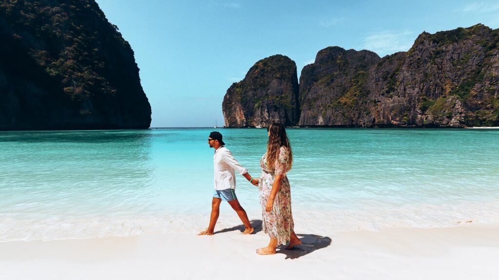 Phuket island hopping: Explore 15 spectacular islands in Southern Thailand 6 One of the best photos on Maya Bay is walking on the sandy shore with the high limestone rocks on the background. The sand in Maya bay is unbelievable soft, like no others, and the sea is pristine as it is a natural reserve and you can't neither swim. Definitely, Maya bay was one of the best highlights of our Phuket island hopping tour