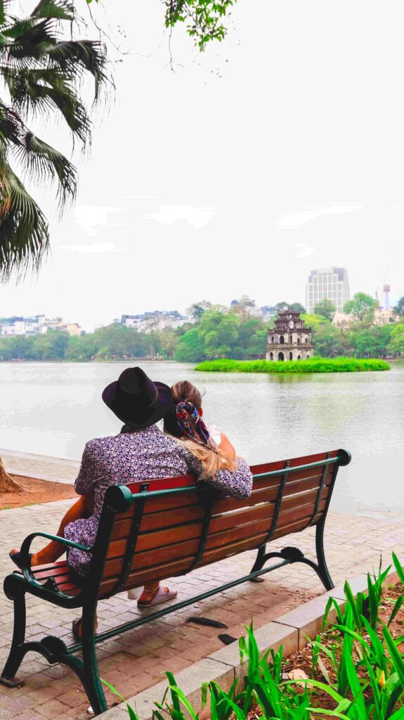 Hanoi city - Bimba and Toti sitting on a bench admiring the cute view