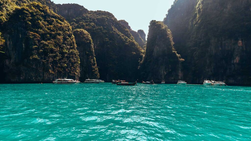 Phuket island hopping: Explore 15 spectacular islands in Southern Thailand 5 The entrance to Maya Bay - This fantastic landscape is achievable staying out of the marine conservation area. This perfect spot is ideal if you want snorkelling and spot unique marine species.