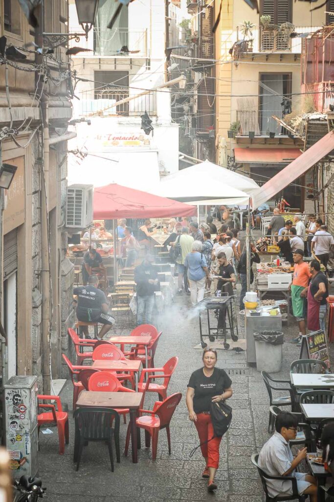 Entrance to Vucciria Market one of the buzzling places in Palermo unmissable for a day in Palermo