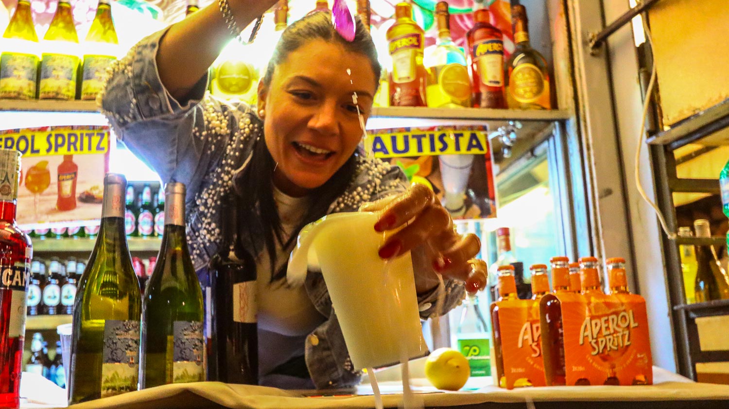 Sicily Travel Guides 2 Lady at drink stand in Palermo - Best street food of Palermo